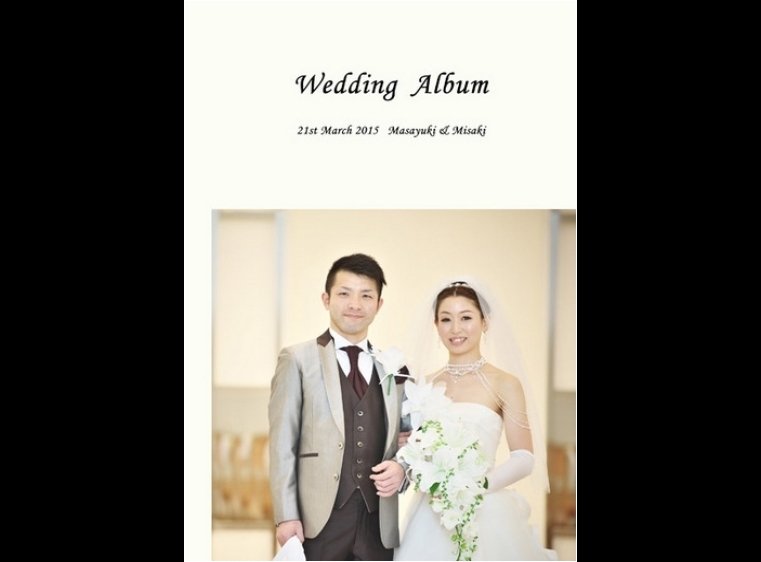 結婚式場は滋賀県のホテルニューオウミ。1頁目：結婚式アルバム