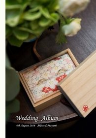 桐の箱に入った桜の模様が可愛らしい和柄のリングピロー、そのお写真を表紙に選ばれました